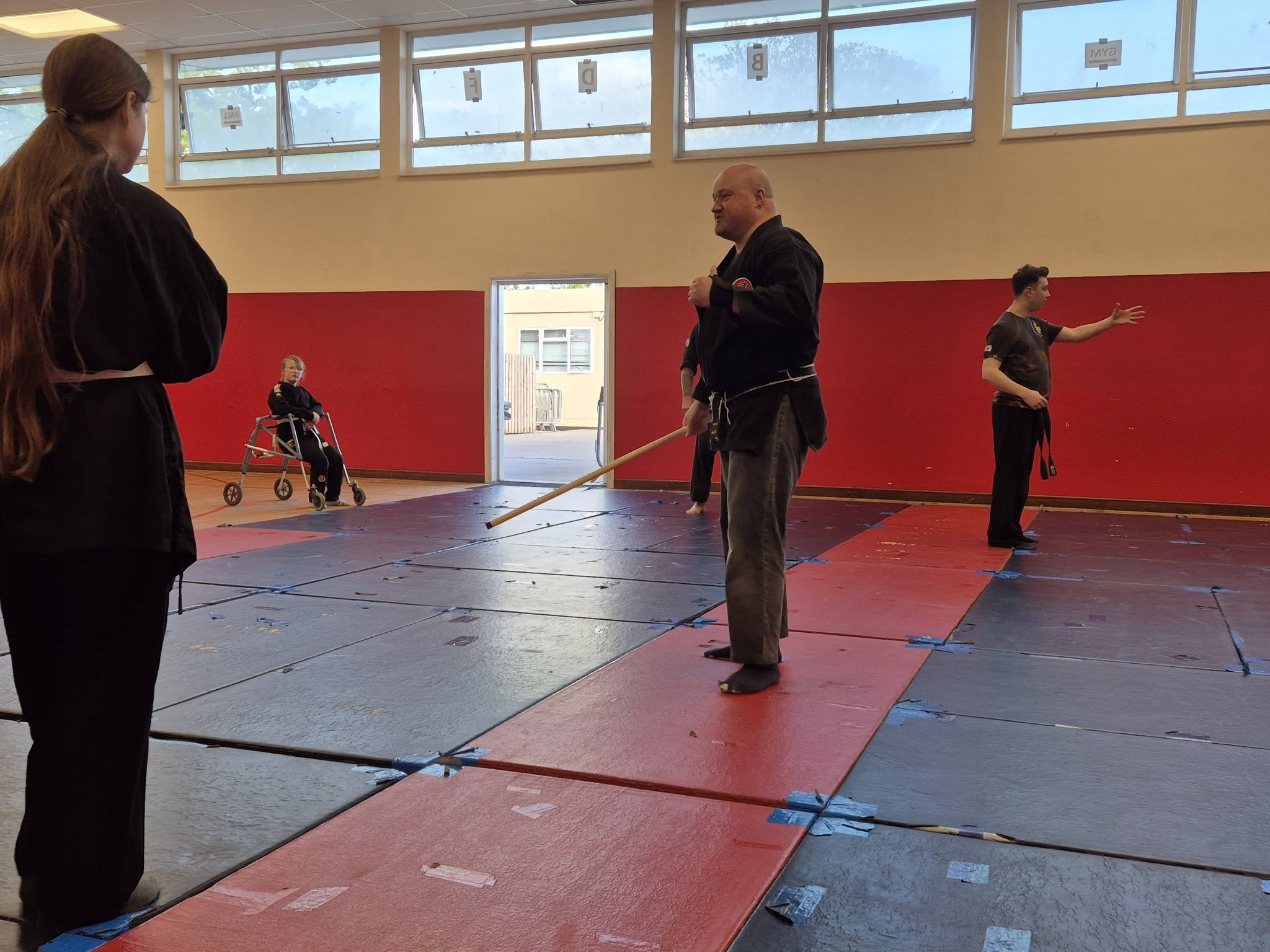 An instructor leading Ju Jitsu practice