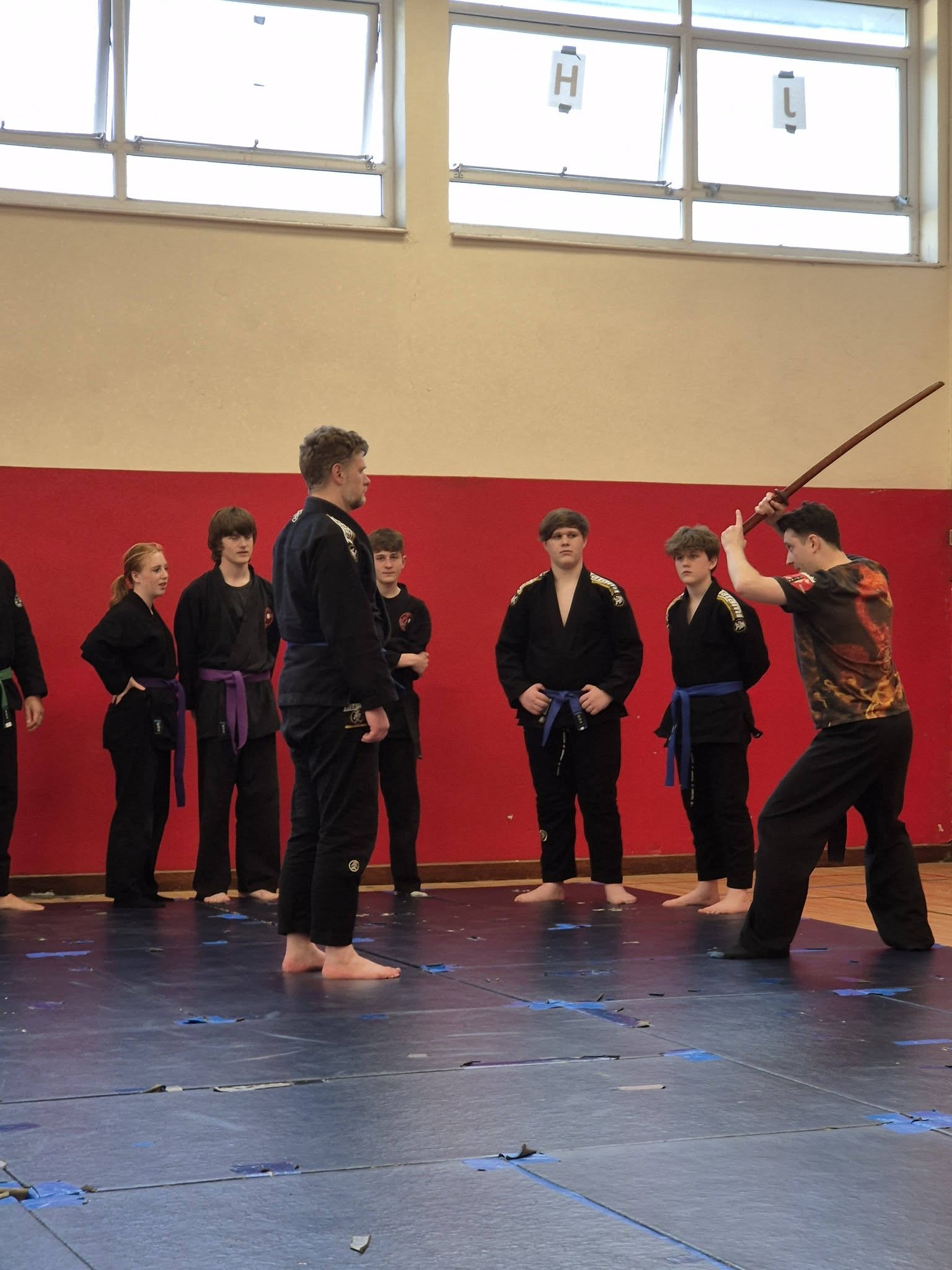 Traditional weapons practice during a club session